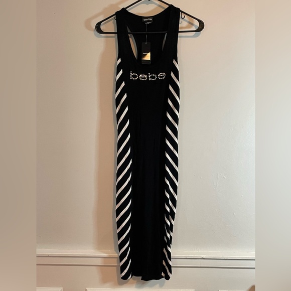 bebe Dresses & Skirts - Bebe Black & White Side Striped Bodycon Midi Dress Size M